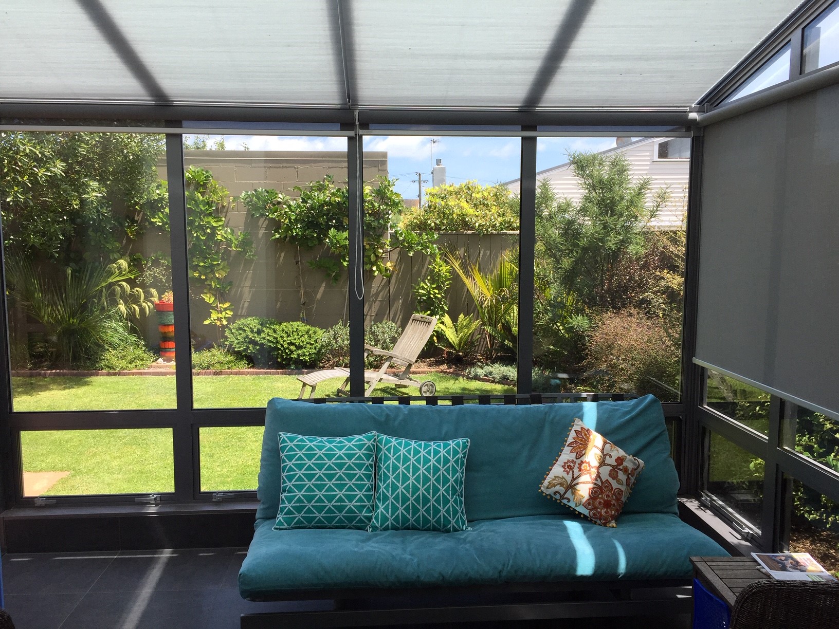 Enclosed garden room looking out over a newly planted rear garden